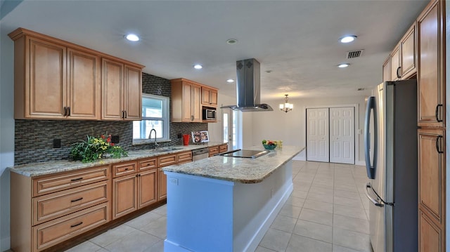 kitchen featuring island range hood, a sink, decorative backsplash, appliances with stainless steel finishes, and a center island