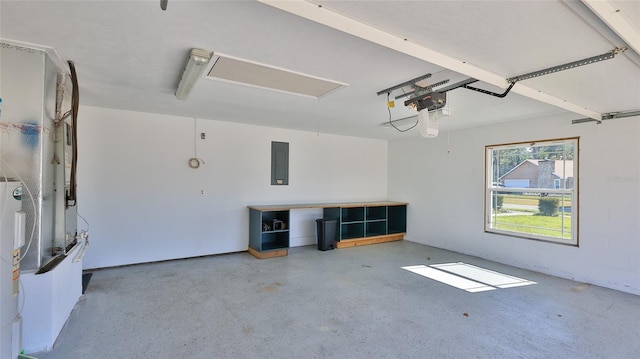 garage with electric panel and a garage door opener