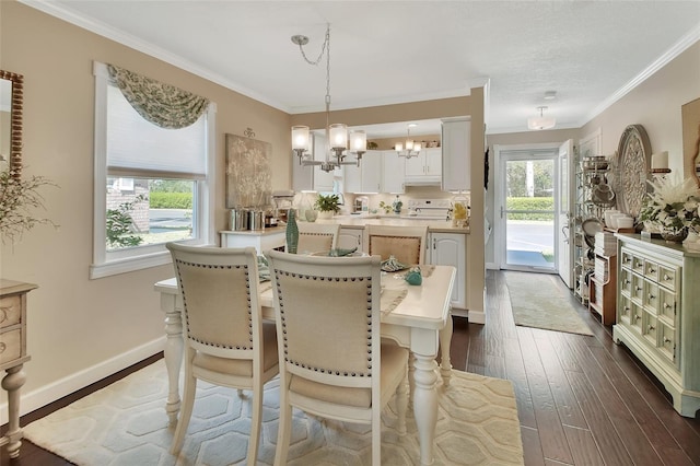 dining space featuring crown molding, baseboards, an inviting chandelier, and dark wood-style flooring