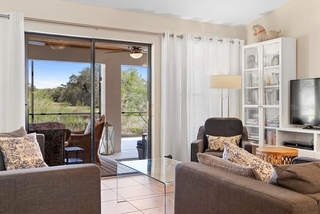 living area with light tile patterned flooring and a wealth of natural light