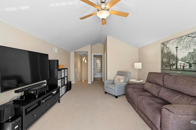 living room with visible vents, light colored carpet, a ceiling fan, and vaulted ceiling