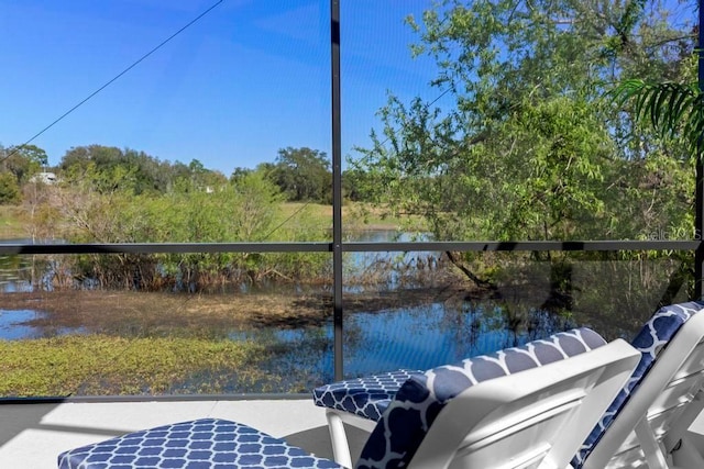 exterior space featuring a patio and a water view