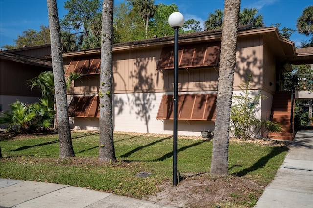 view of home's exterior featuring a yard