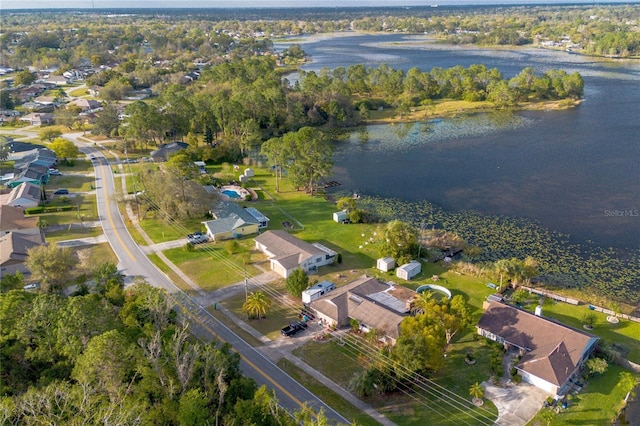 bird's eye view featuring a water view and a residential view