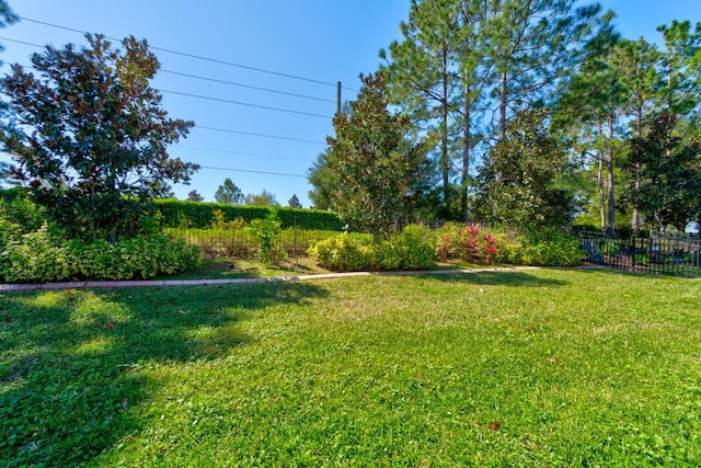 view of yard with fence