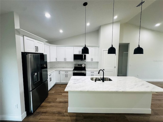 kitchen featuring dark wood-style floors, a sink, appliances with stainless steel finishes, white cabinetry, and backsplash