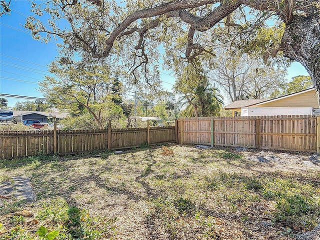 view of yard with fence