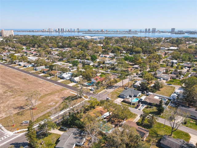 aerial view with a city view and a water view