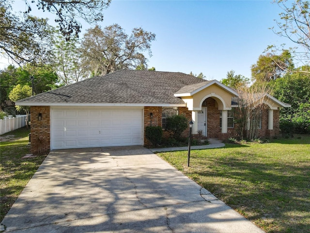 view of front of home featuring a front lawn, fence, concrete driveway, a garage, and brick siding