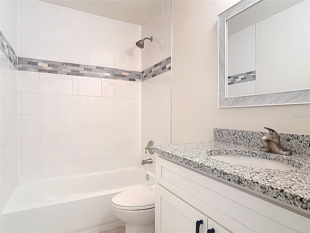 full bathroom with a textured ceiling, toilet, vanity, and shower / tub combination