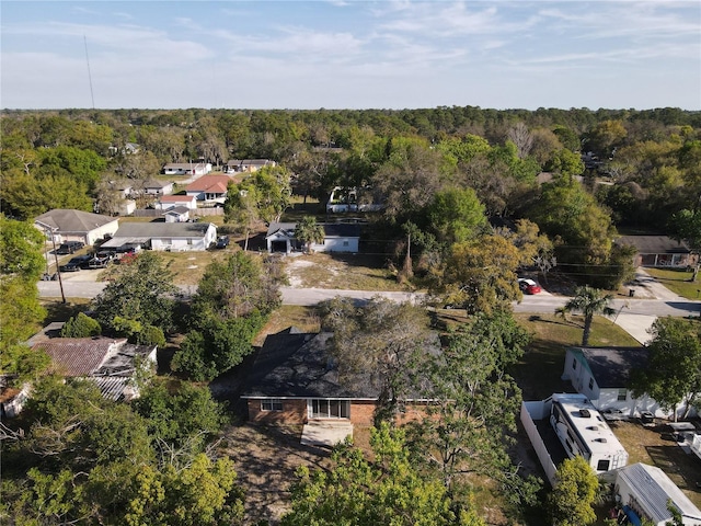 bird's eye view featuring a view of trees