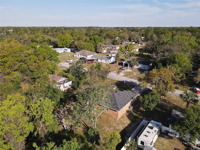 bird's eye view featuring a view of trees