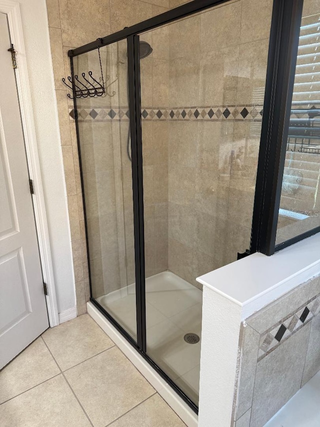 1812 Leather Fern Dr, Ocoee, FL 34761 - full bathroom featuring a stall shower and tile patterned floors