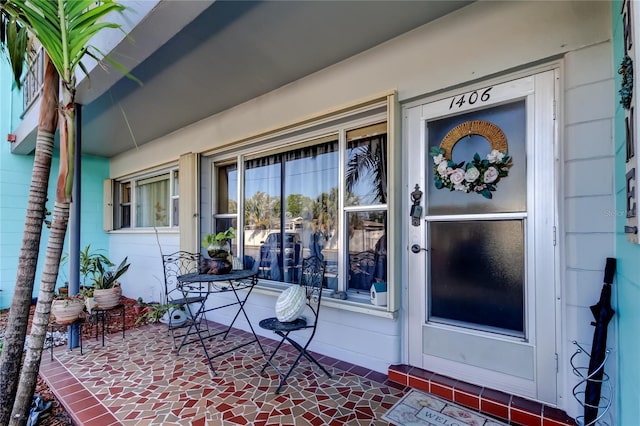 entrance to property with covered porch