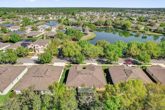 birds eye view of property featuring a residential view and a water view