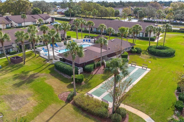 birds eye view of property with a residential view