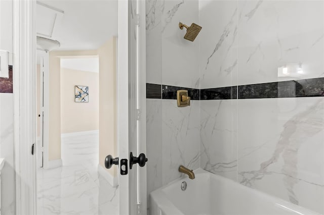 bathroom with shower / washtub combination and marble finish floor