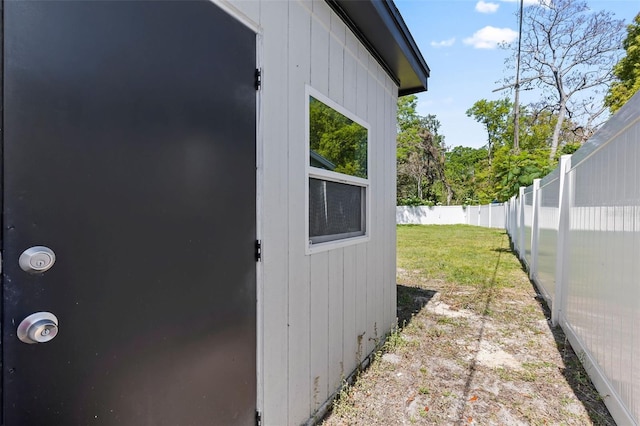 exterior space with a fenced backyard