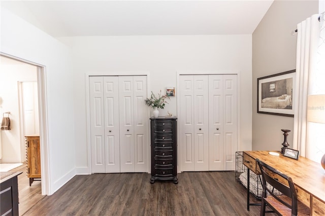 office with baseboards and dark wood-style flooring