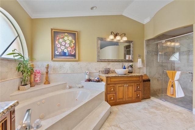 bathroom with a stall shower, vanity, and crown molding