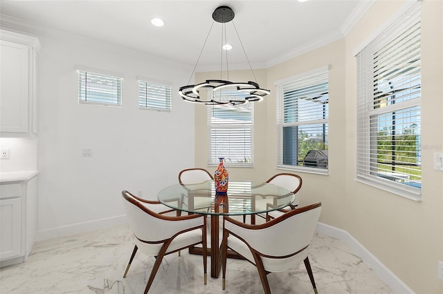 dining space featuring baseboards, marble finish floor, and crown molding