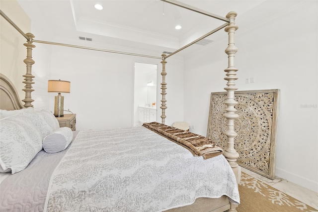 bedroom featuring visible vents, marble finish floor, a raised ceiling, and ornamental molding