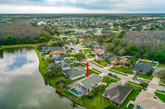 aerial view with a residential view and a water view