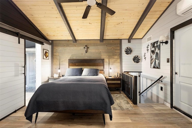 bedroom with an AC wall unit, vaulted ceiling with beams, wood ceiling, and light wood-type flooring