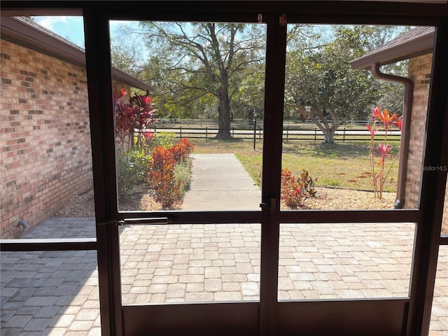 entryway with brick wall