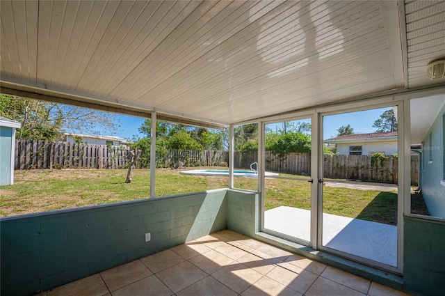 unfurnished sunroom featuring plenty of natural light