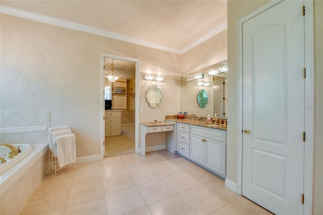 bathroom with a garden tub, ornamental molding, vanity, and tile patterned flooring