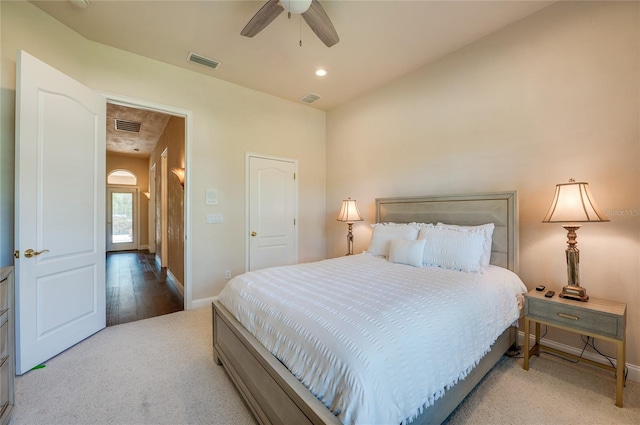 bedroom featuring baseboards, visible vents, and ceiling fan