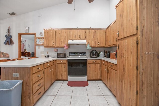 kitchen with range hood, a peninsula, light tile patterned flooring, electric range oven, and light countertops