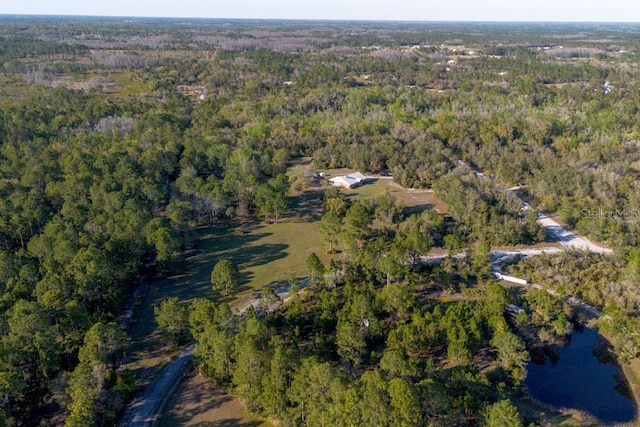 bird's eye view with a view of trees