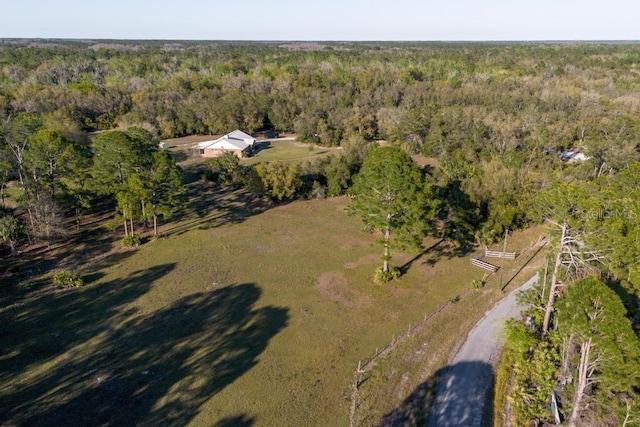 aerial view featuring a forest view