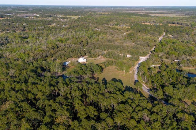 drone / aerial view with a forest view