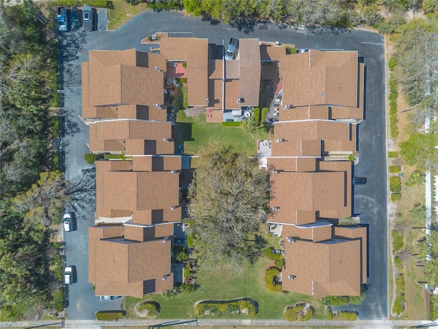 birds eye view of property with a residential view