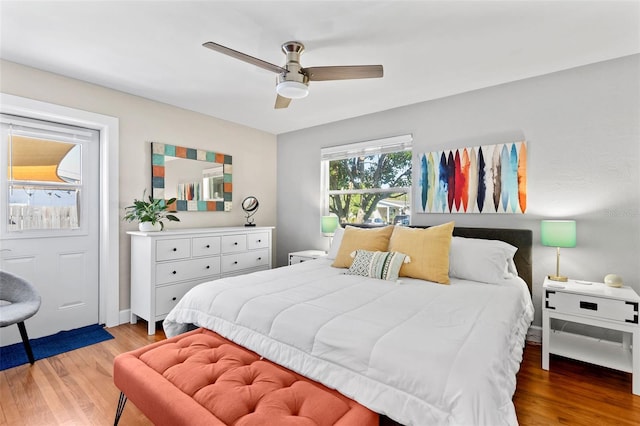 bedroom featuring light wood-style floors and ceiling fan