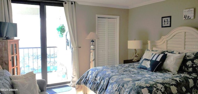 bedroom featuring multiple windows and crown molding