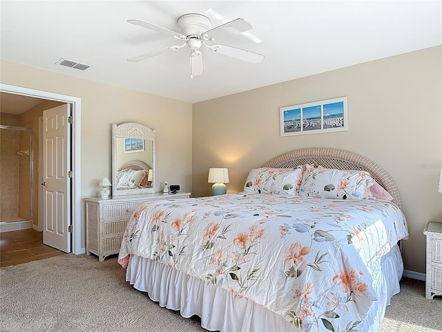 bedroom featuring visible vents, baseboards, ceiling fan, and carpet flooring