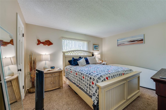 carpeted bedroom with a textured ceiling