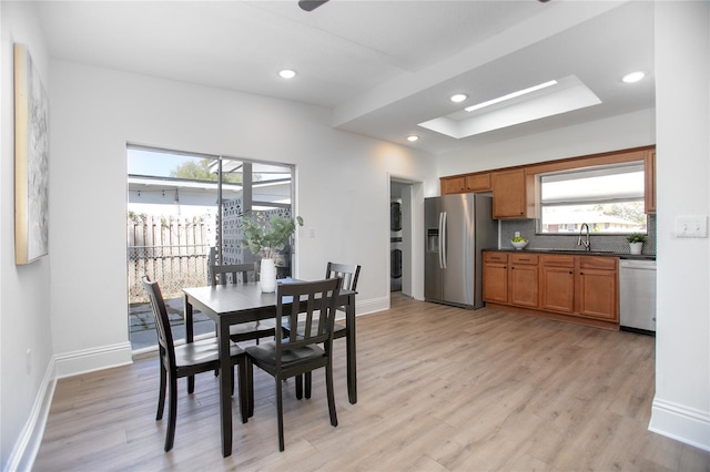 dining room featuring a wealth of natural light, recessed lighting, and light wood finished floors