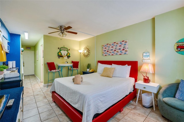 bedroom featuring light tile patterned floors and a ceiling fan