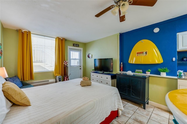 tiled bedroom with a ceiling fan