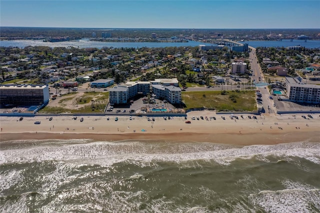 aerial view with a beach view and a water view