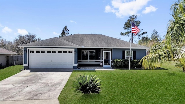 ranch-style home featuring driveway, a front yard, roof with shingles, and an attached garage