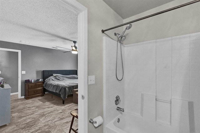 ensuite bathroom with ensuite bath, a textured ceiling,  shower combination, and ceiling fan