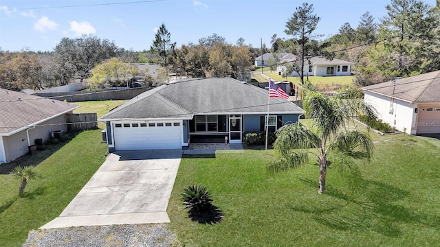 ranch-style house with concrete driveway, a garage, a front yard, and a shingled roof