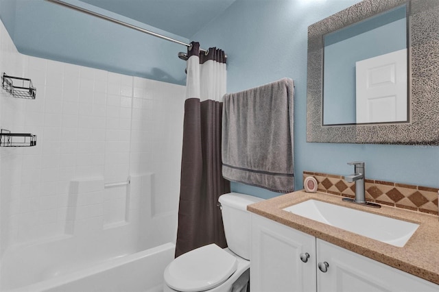 bathroom with shower / bathtub combination with curtain, toilet, and vanity