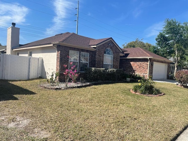 single story home featuring a front lawn, fence, an attached garage, brick siding, and a chimney